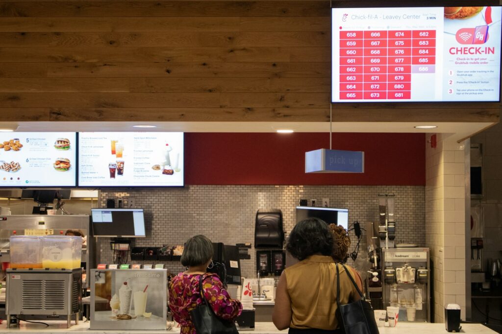 Women lining up in front of Chick-fil-A counter