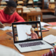 Young student watching educational online class or tutorial video